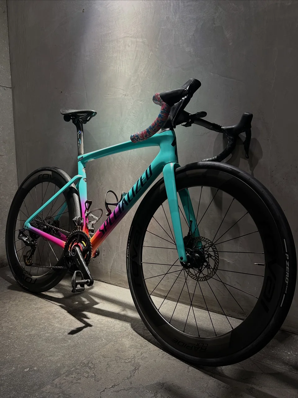 Turquoise and pink Specialized road bike after a service